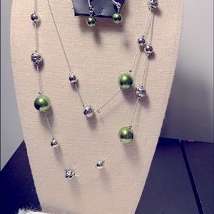 Green and silver beaded  long necklace and earrings.